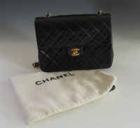 Lot 388 - A Chanel vintage black quilted lambskin medium flap shoulder bag