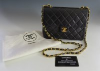 Lot 389 - A Chanel vintage black quilted lambskin medium flap shoulder bag