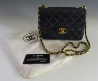 Lot 393 - A Chanel vintage navy quilted lambskin flap shoulder mini bag