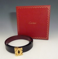 Lot 148 - A Cartier red and black leather reversible ladies' belt