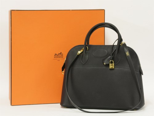 Lot 387 - An Hermès Paris 'Bolide' navy handbag