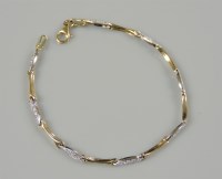 Lot 42 - A 9ct gold two colour gold cubic zirconia set bracelet