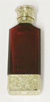 Lot 247 - A Victorian silver gilt mounted ruby glass combined vinaigrette and scent bottle