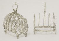 Lot 162 - A pair of Victorian silver five bar ‘galleon’ end toast racks