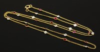 Lot 413 - A ruby and diamond set gold chain