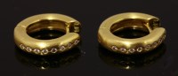 Lot 518 - A pair of 18ct gold diamond set hinged hoop earrings