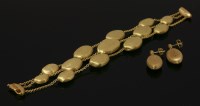 Lot 519 - A gold Confetti bracelet and earring suite