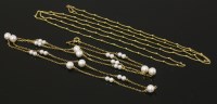 Lot 520 - A gold chain and cultured pearl necklace