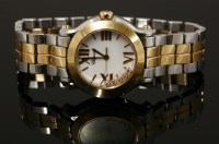 Lot 631 - A ladies' stainless steel and rose gold bicolour Chopard 'Happy Sport' quartz bracelet watch