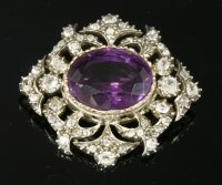 Lot 325 - A Victorian amethyst and diamond lozenge-shaped brooch