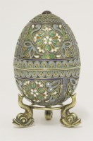Lot 10 - A Russian silver gilt and cloisonné enamel Easter egg