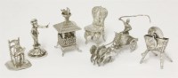 Lot 226 - A collection of five late 19th/early 20th century silver miniatures and a desk seal