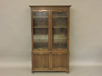 Lot 326 - An oak glazed bookcase