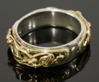 Lot 313 - A sterling silver and gold ring