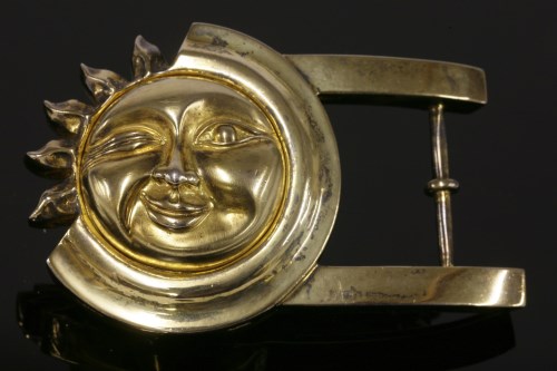 Lot 154 - A Barry Kieselstein cord silver gilt celestial smiling/winking sun belt buckle