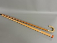 Lot 312 - A simulated wood walking stick