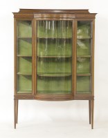 Lot 483 - An Edwardian mahogany bow front display cabinet