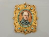 Lot 48 - A gold mounted portrait miniature on ivory