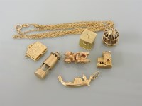 Lot 9 - Seven assorted gold charms