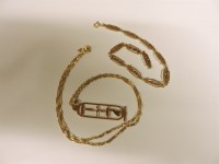 Lot 31 - A gold Egyptian hieroglyphics link bracelet