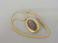 Lot 15 - An 18ct gold opal triplet brooch/pendant