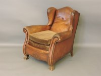 Lot 512A - A 1920s leather armchair