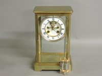 Lot 248 - ##A late Victorian brass cased four glass mantel clock