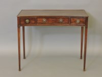 Lot 487 - A mahogany concave side table