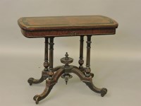 Lot 553 - A Victorian amboyna and ebonised card table