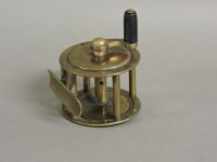 Lot 148 - A 2in brass crankwind reel