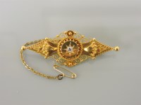 Lot 35 - A Victorian 15ct gold diamond set bar brooch