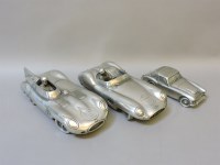 Lot 166 - Two large pewter replica models of classic racing cars