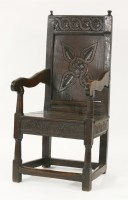 Lot 332 - An oak armchair