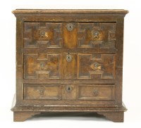 Lot 339 - An oak chest of three drawers