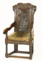 Lot 350 - An oak armchair