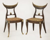 Lot 477 - A pair of Empire style side chairs