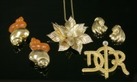 Lot 25 - A Christian Dior gold-plated poinsettia pendant