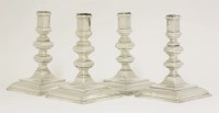 Lot 20 - A set of four Tiffany metalwares candlesticks