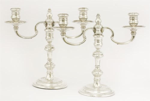 Lot 63 - A pair of silver two-light candelabra
