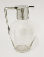 Lot 49 - A Edwardian silver-mounted glass claret jug