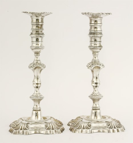 Lot 94 - A pair of silver candlesticks