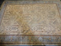 Lot 351 - A large Persian camel ground carpet