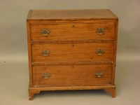 Lot 403 - A mahogany three drawer chest