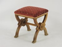 Lot 440 - A Victorian oak Gothic Revival 'x' framed foot stool