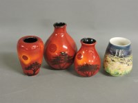 Lot 199 - Three Poole Pottery African Sky vases