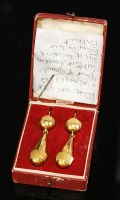 Lot 270 - A pair of cased gold Regency drop earrings
