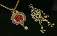 Lot 374 - An Indian high carat gold and enamel Vishnupada pendant