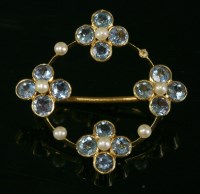 Lot 470 - An aquamarine and seed pearl circle brooch