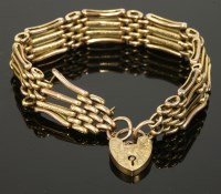 Lot 39 - A four row gold gate bracelet