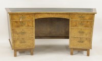 Lot 442 - A burr walnut bow front desk